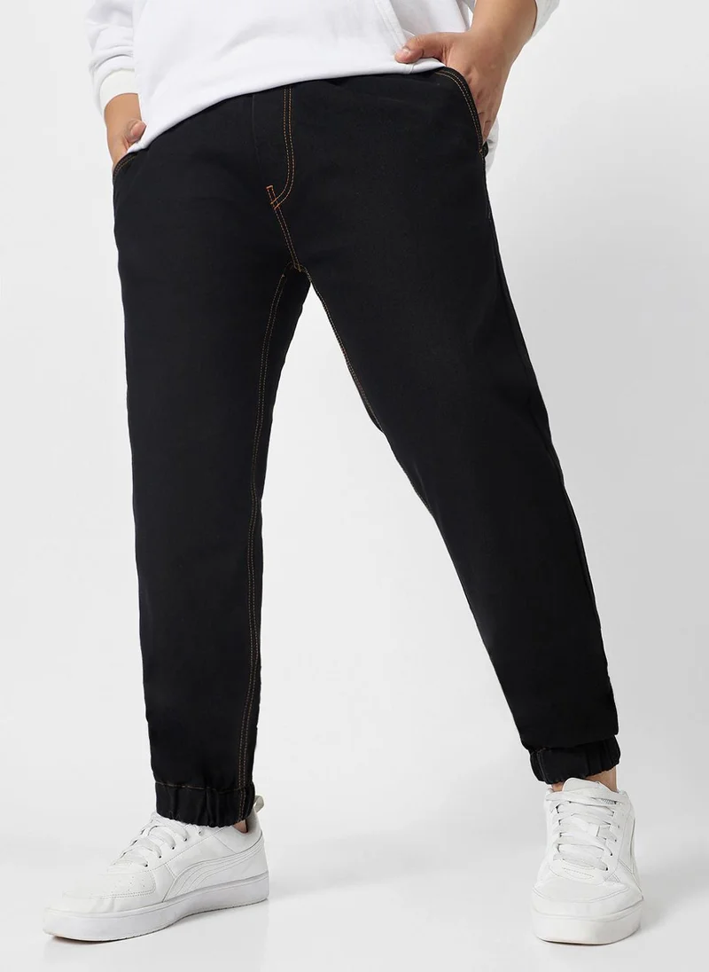 Urbano Fashion  Urbano Plus Men's Jet Black Regular Fit Washed Jogger Jeans Stretchable for Men | Best Price UAE